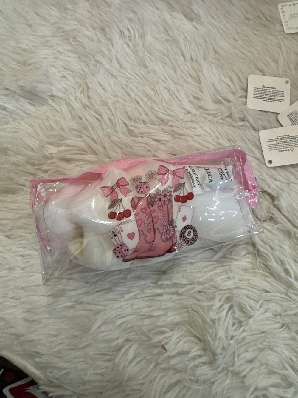 Pink cowboy boots pouch keychain with cherries, dice, and playing cards design